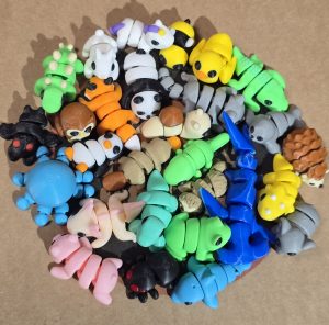 Minimals Bolsa Misteriosa Fidget Toys, Juguetes flexibles, juguetes sensoriales